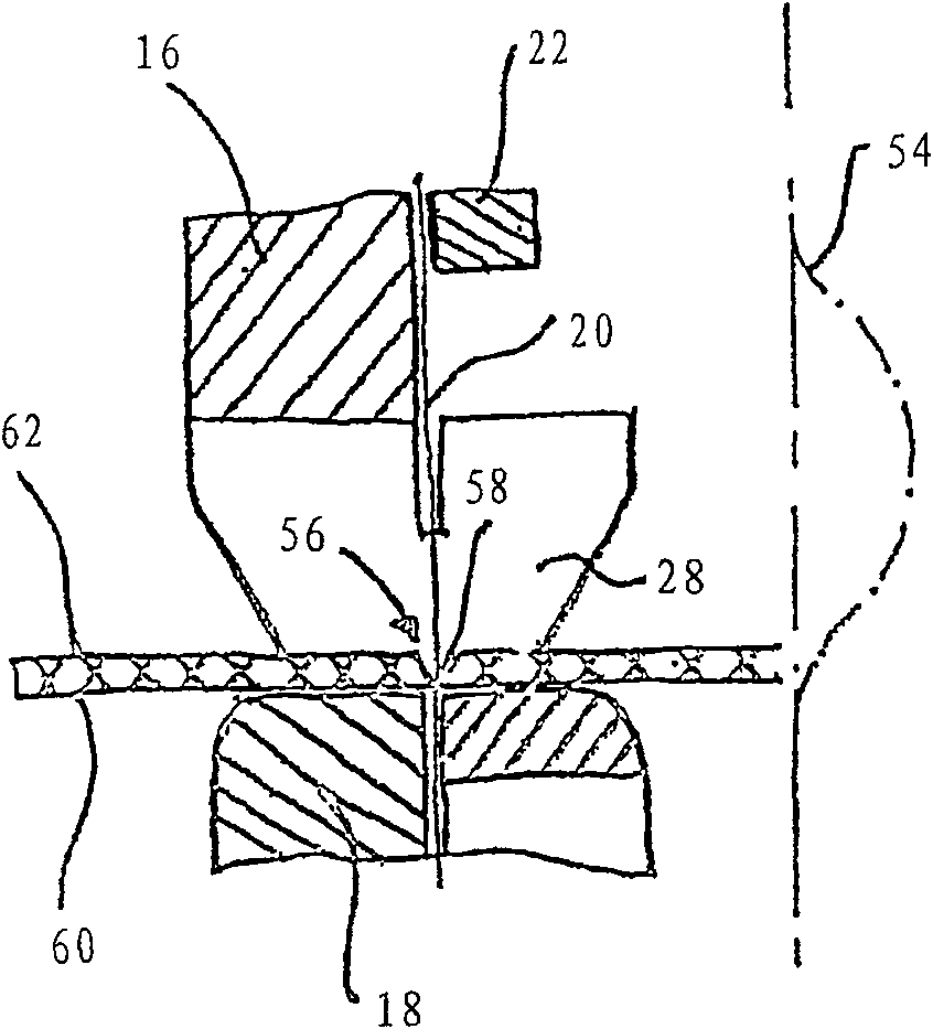 Cutting device for thermally cutting a running, in particular, patterned textile web