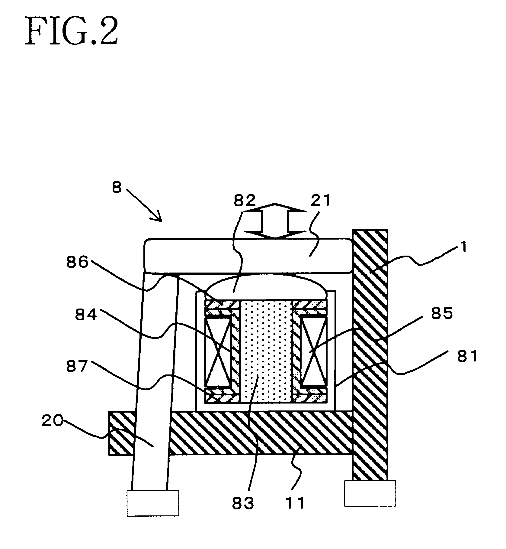 Load detecting system and automatic washing machine equipped with a system for detecting the magnitude of the load acting on a magnetostrictive element