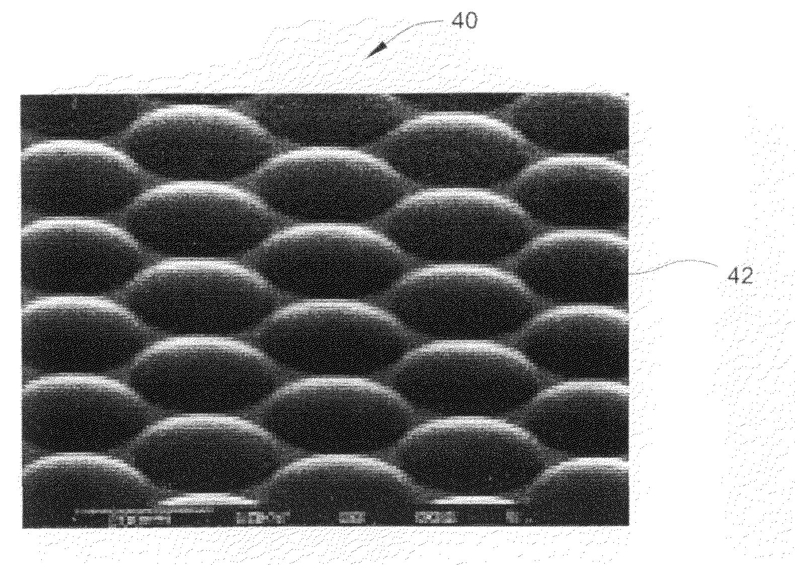 Method of fabricating small dimensioned lens elements and lens arrays using surface tension effects