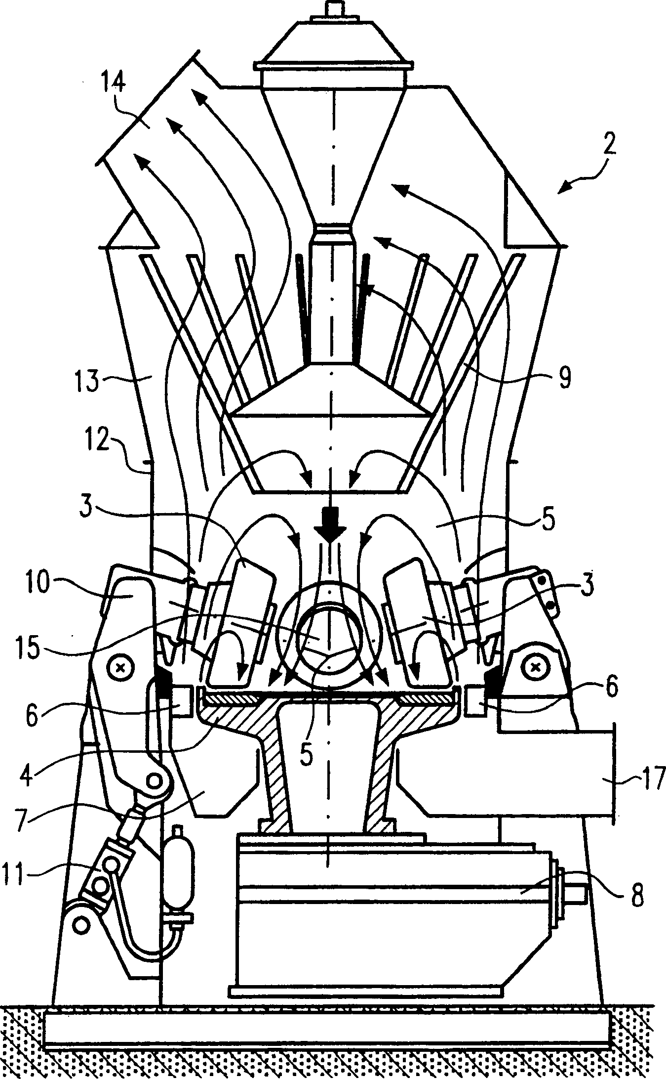 Roller grinding mill and method for grinding materials that contain magnetizable components