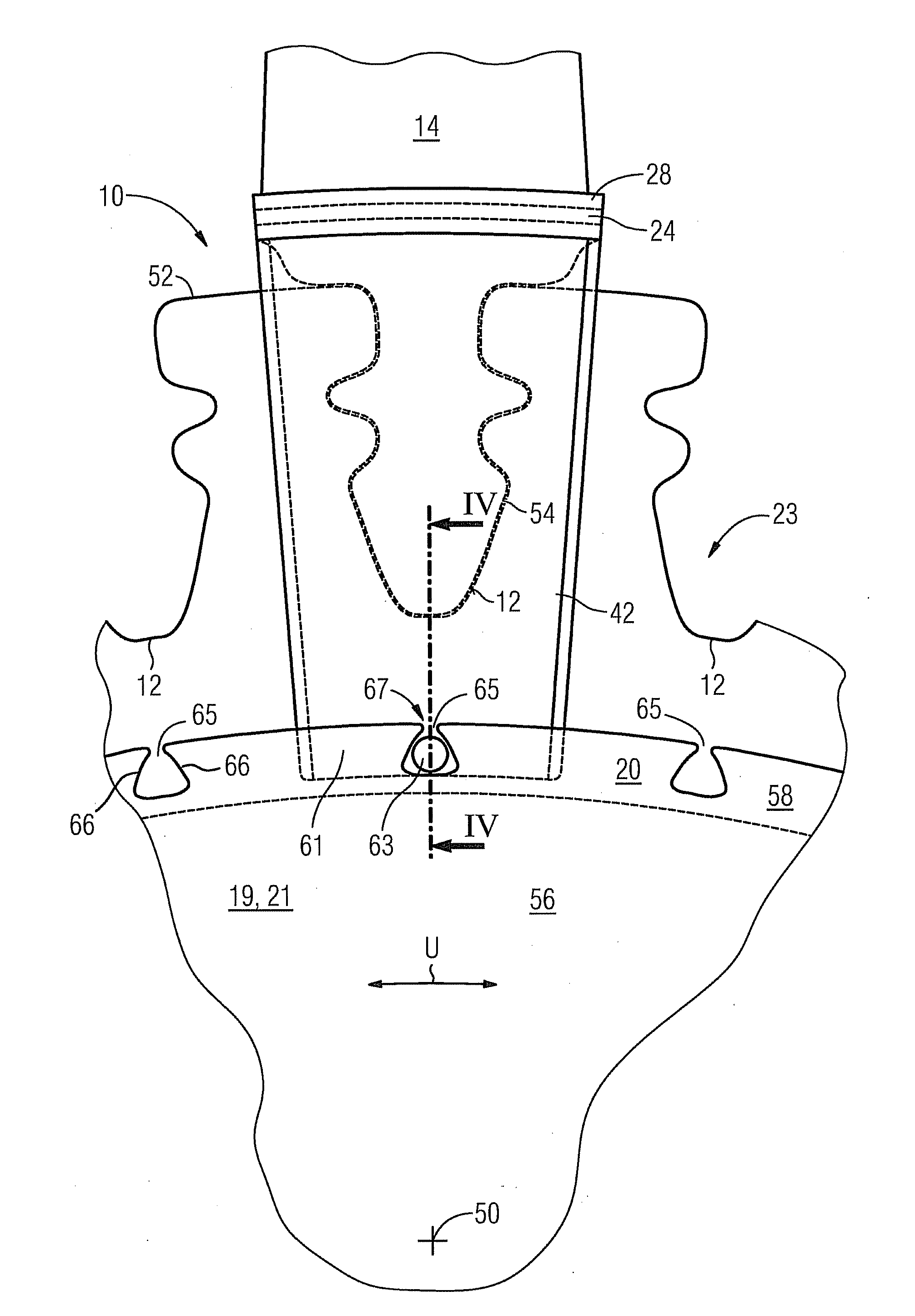 Arrangement for axially securing rotating blades in arotor, and gas turbine having such an arrangement