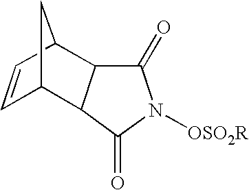 Polymers and photoresists comprising same