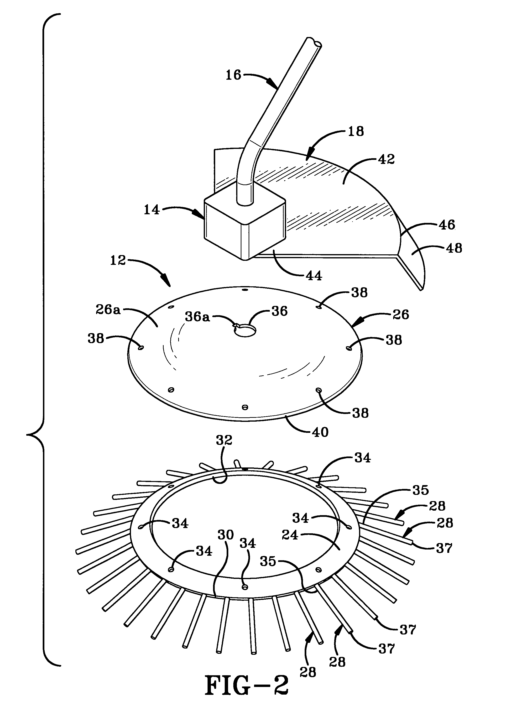 Rotary tool for spreading particulate materials and method of using the same