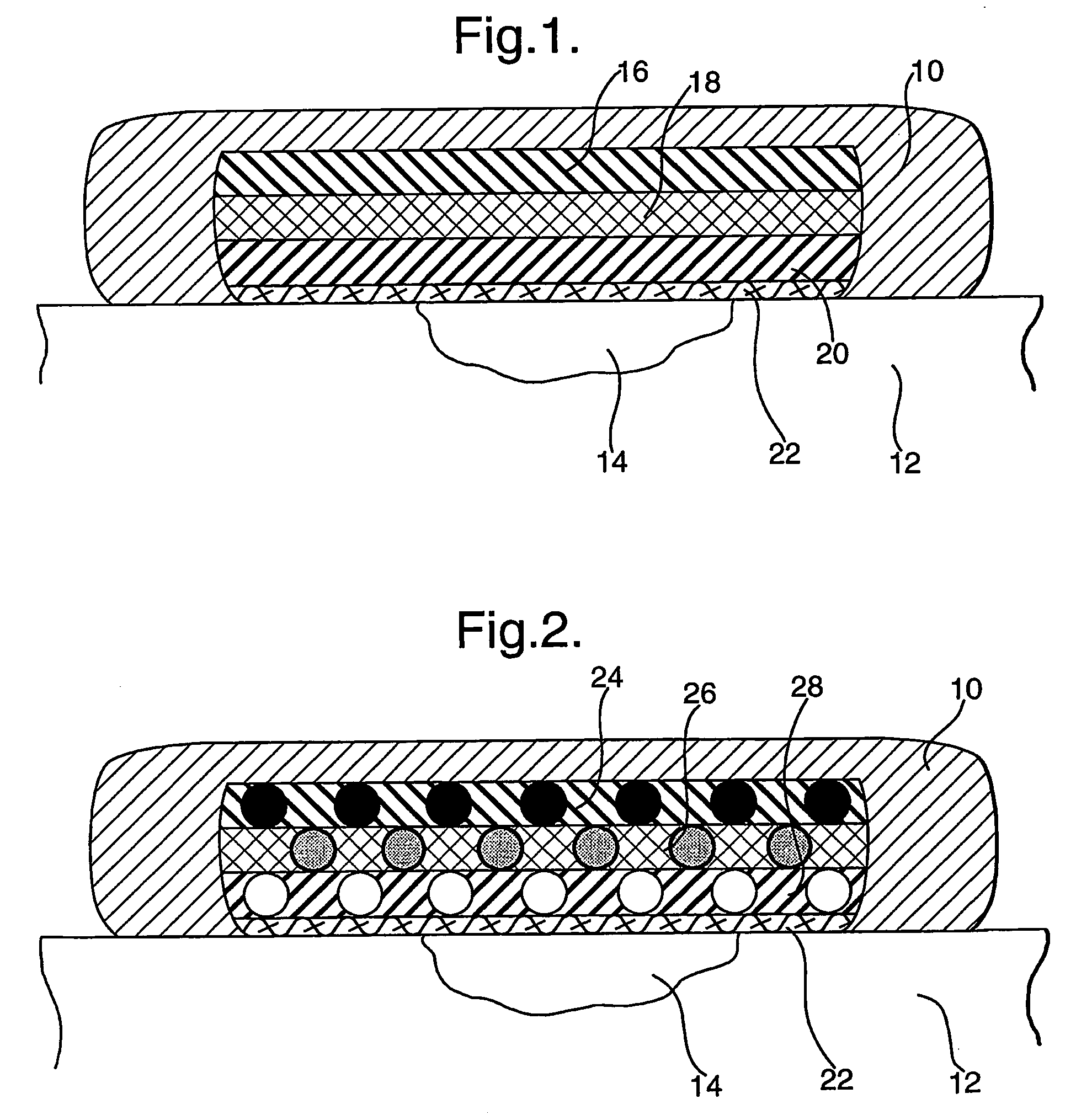 Wound dressings comprising hydrated hydrogels and enzymes