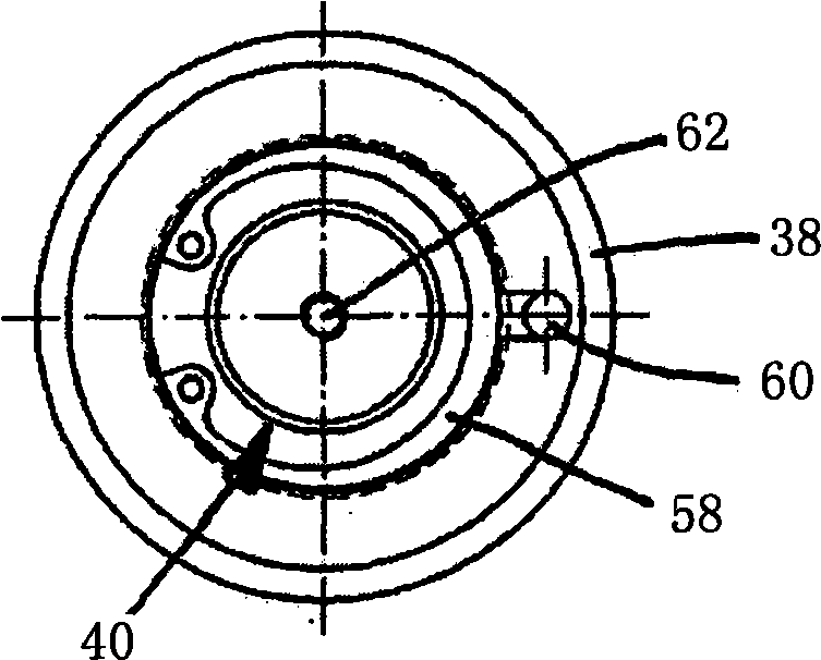 Injection moulding device comprising needle valve nozzles in a back-to-back arrangement