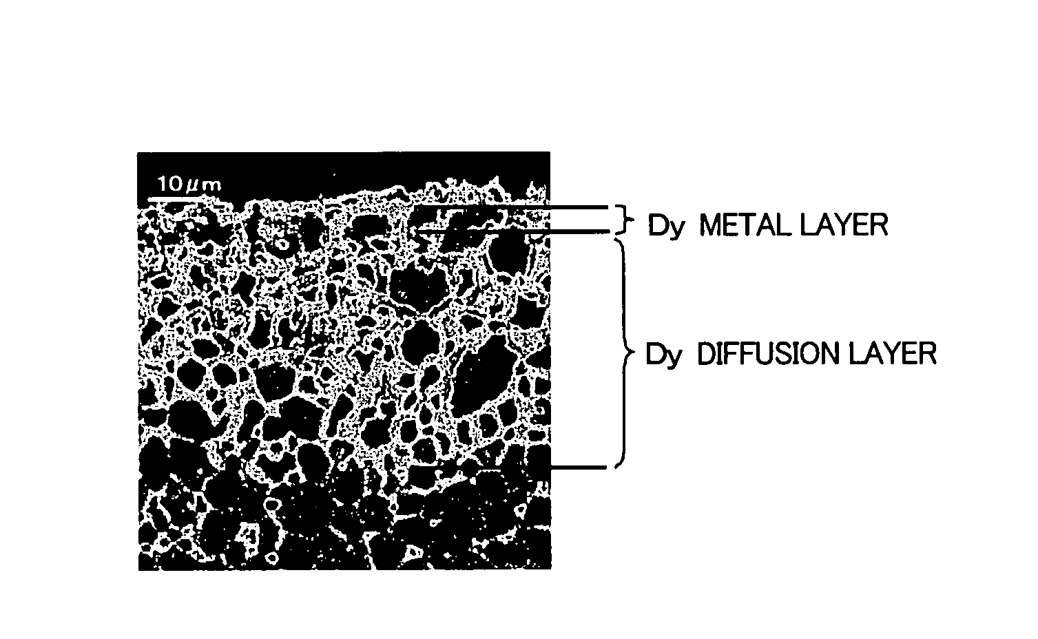 Nd-Fe-B magnet with modified grain boundary and process for producing the same