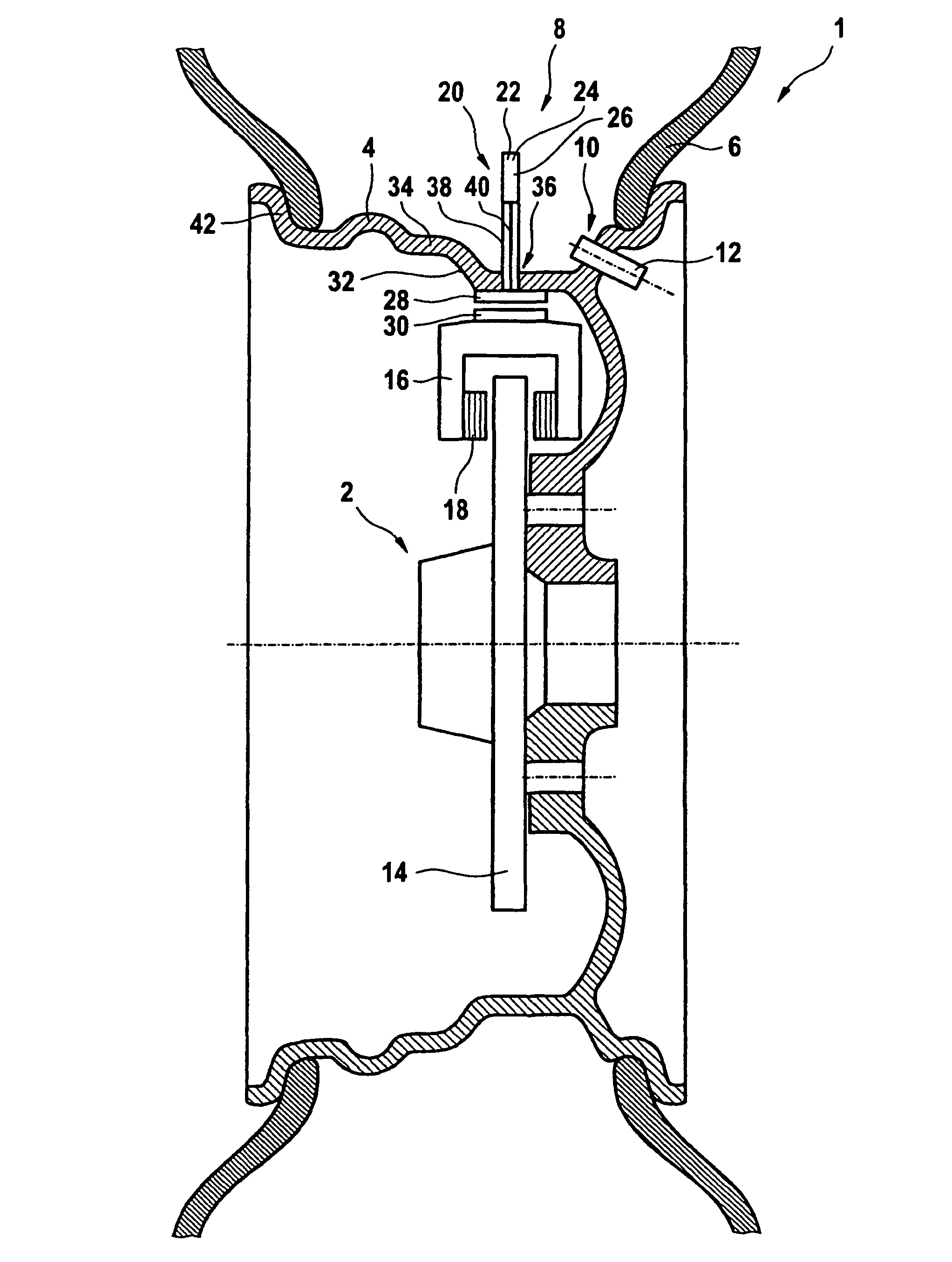 Tire pressure monitoring device having power supplied by magnetic induction
