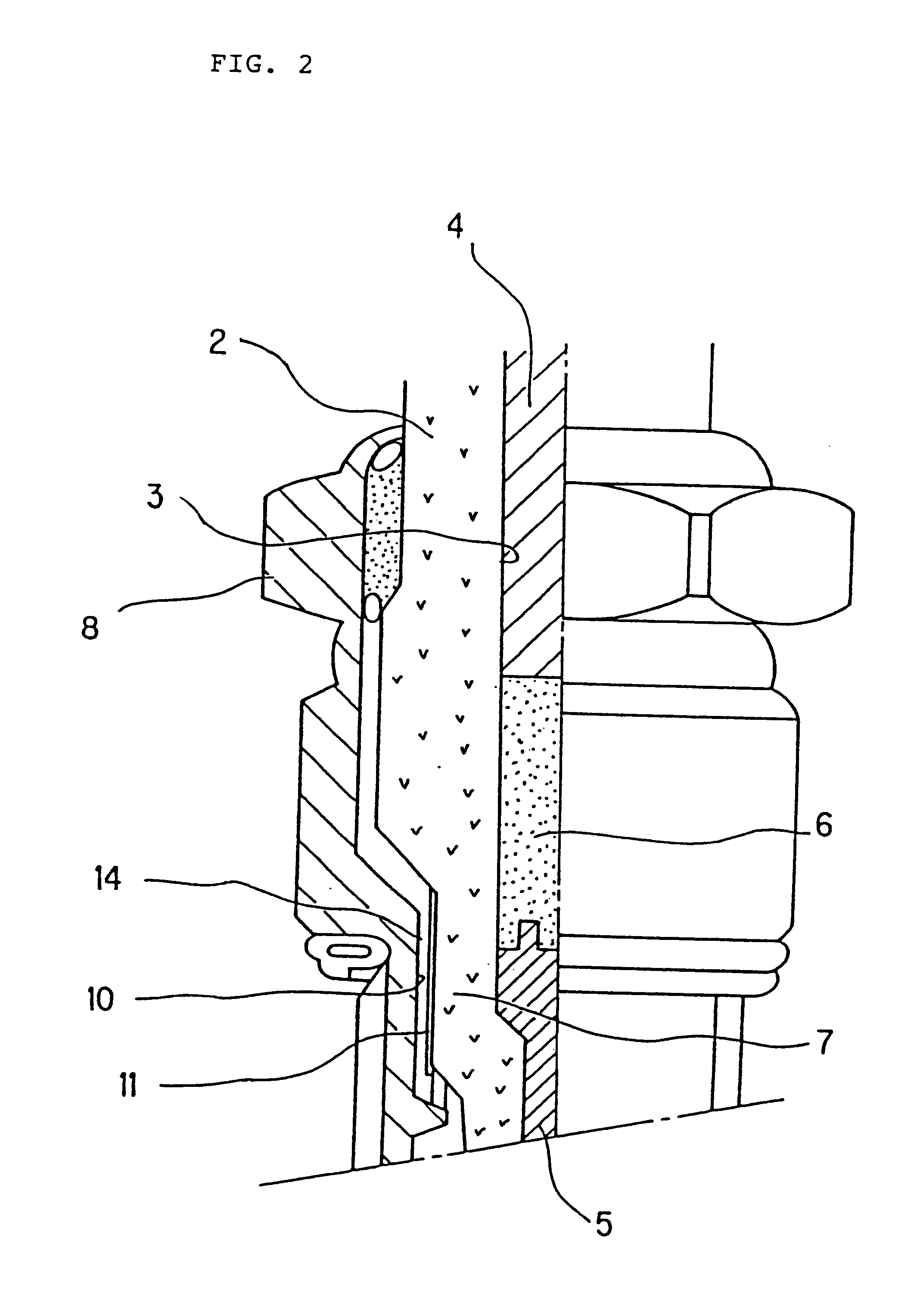 Spark plug having an oil film on an intermediate portion of the insulator or intermediate portion of the metallic shell