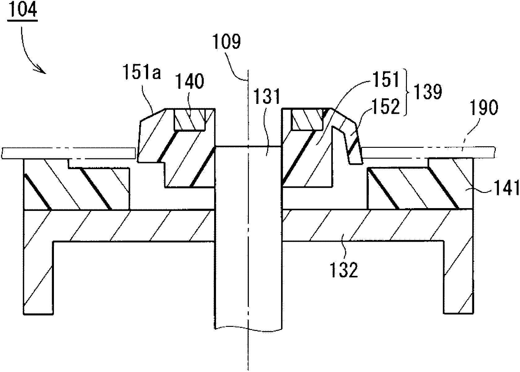Clamping device, motor, and disk drive device