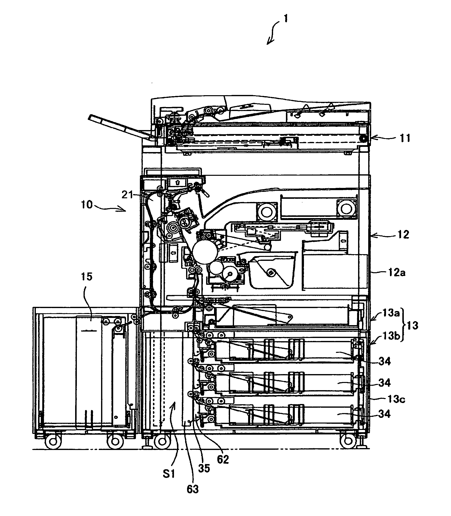 Image forming system and image forming apparatus being configured for easy removal of jammed recording material and for reducing installation space