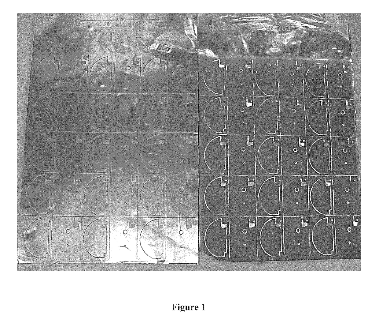 Use of etch resist masked anode frame for facilitation of laser cutting, particle and leakage current reduction