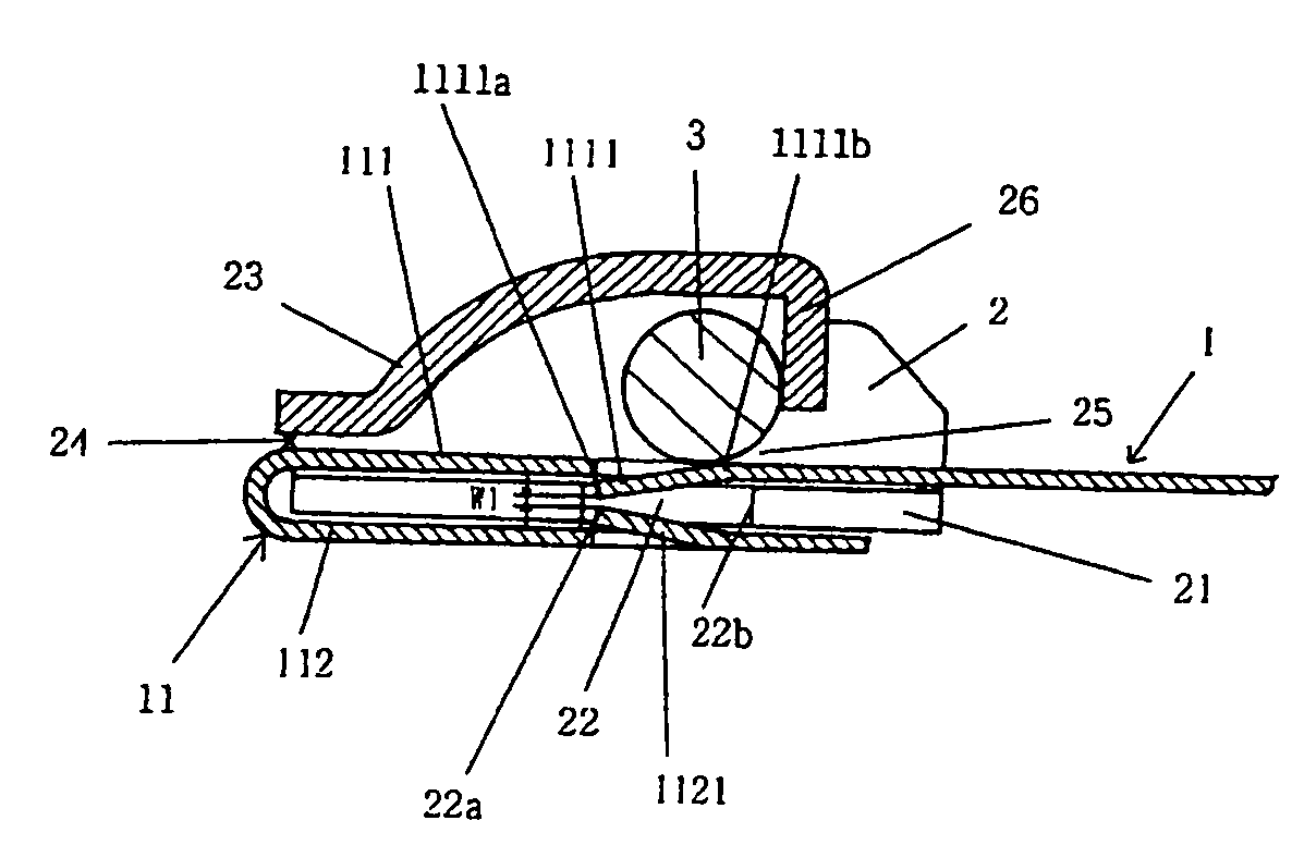Ball type cable tie having release prevention tongue