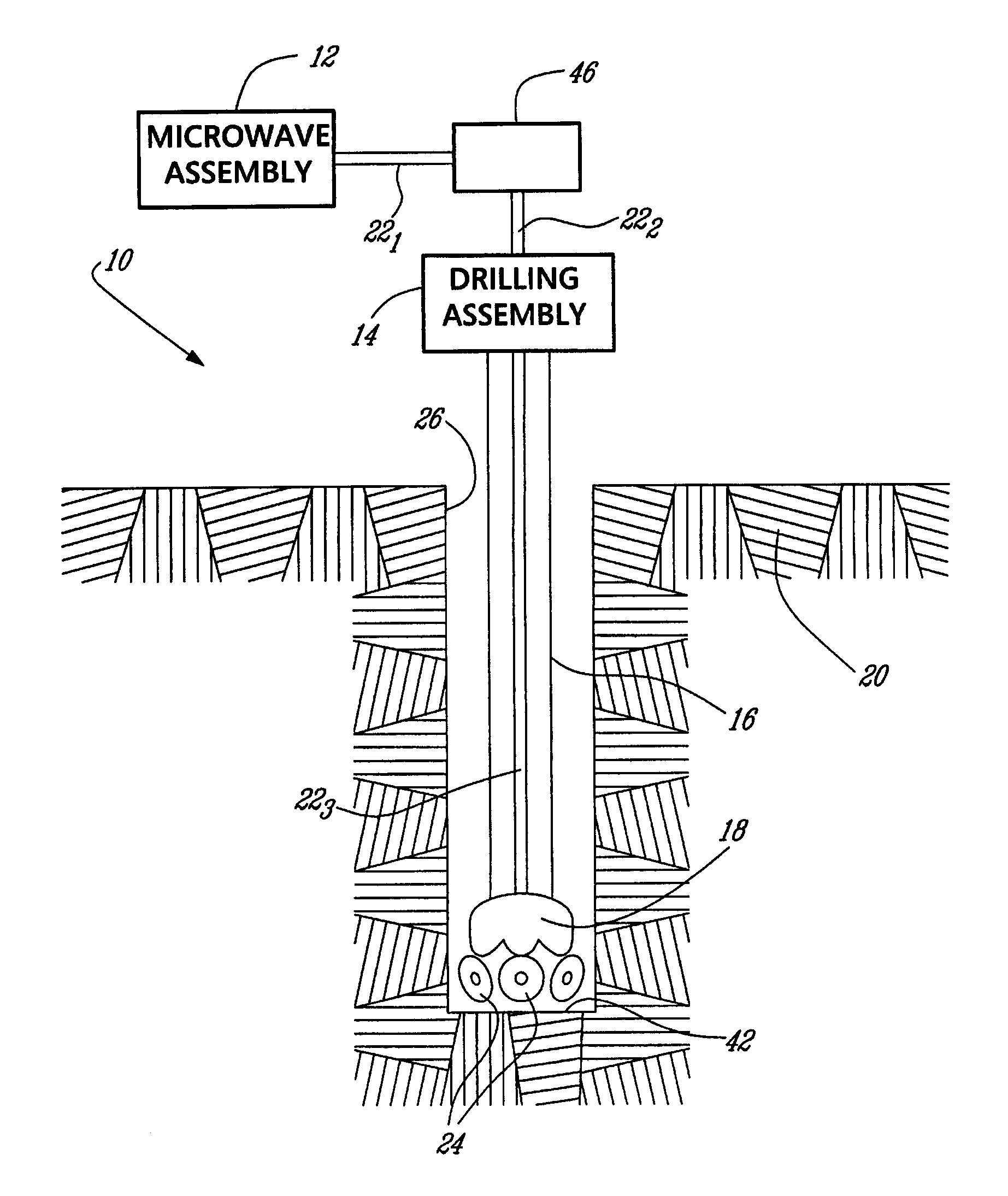 Electromagnetic energy assisted drilling system and method