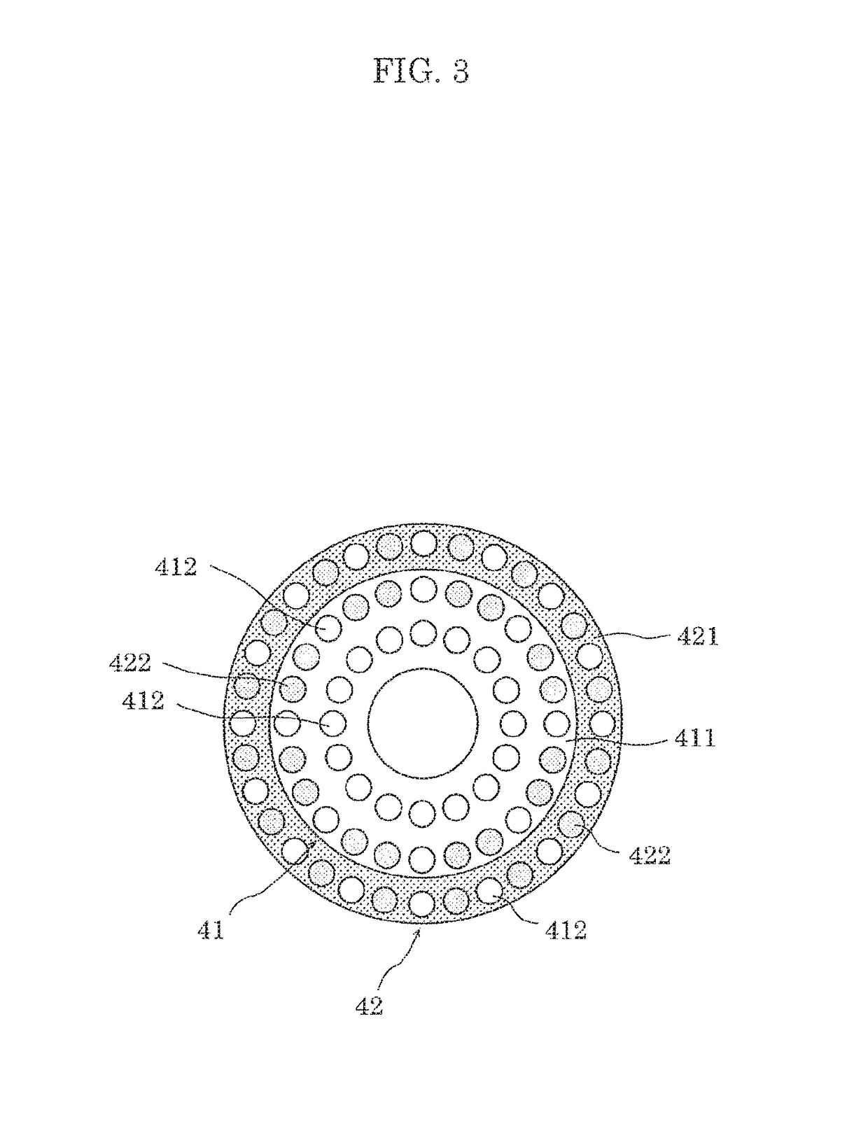 Lighting apparatus with lower color temperature lighting to a peripheral region