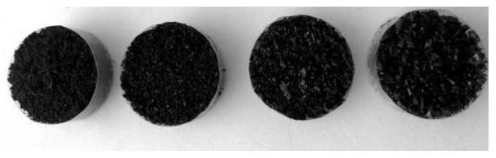 A metal powder-rubber particle composite phonon material, preparation method and application
