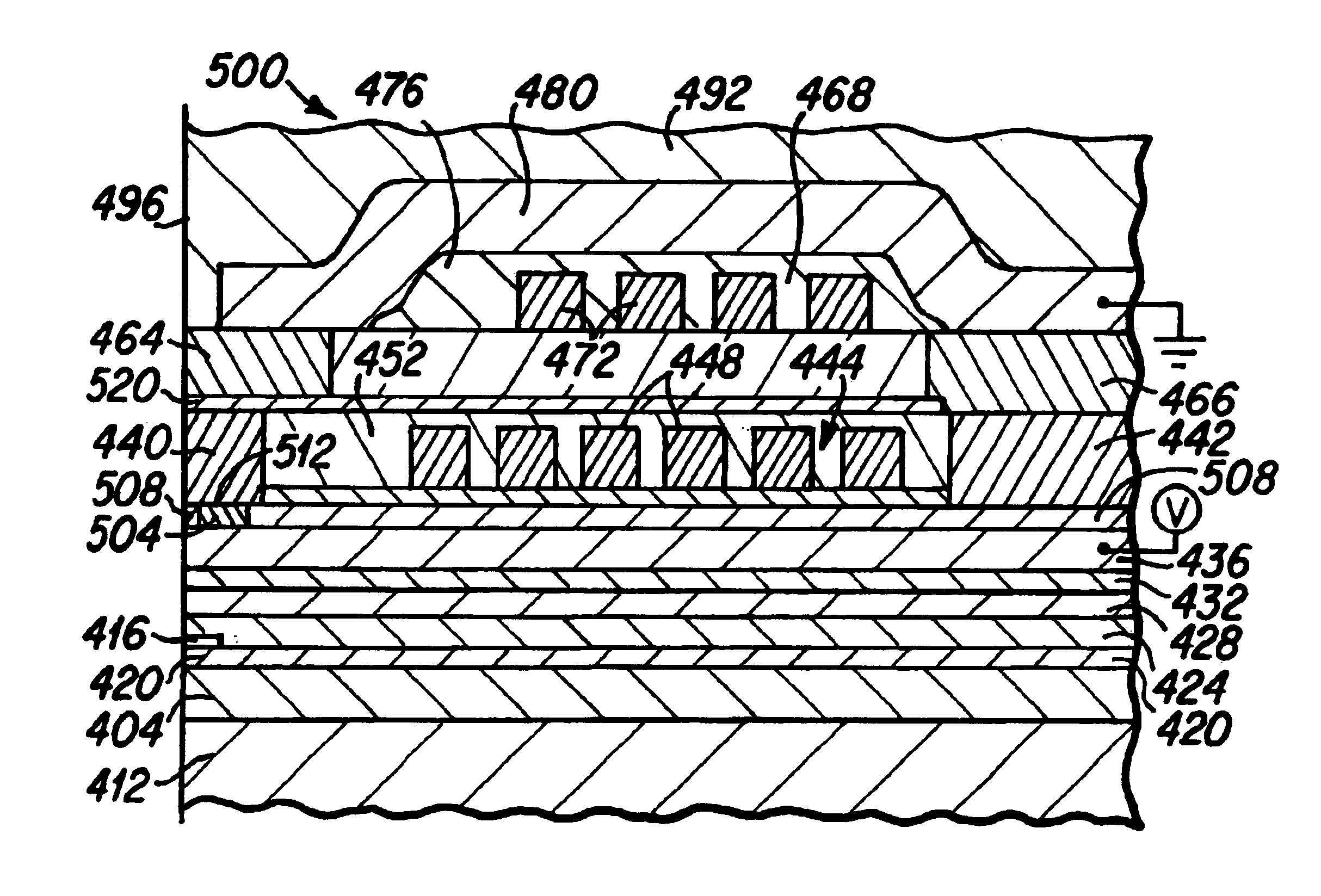 Magnetic head having media heating device that is electrically connected to magnetic pole piece