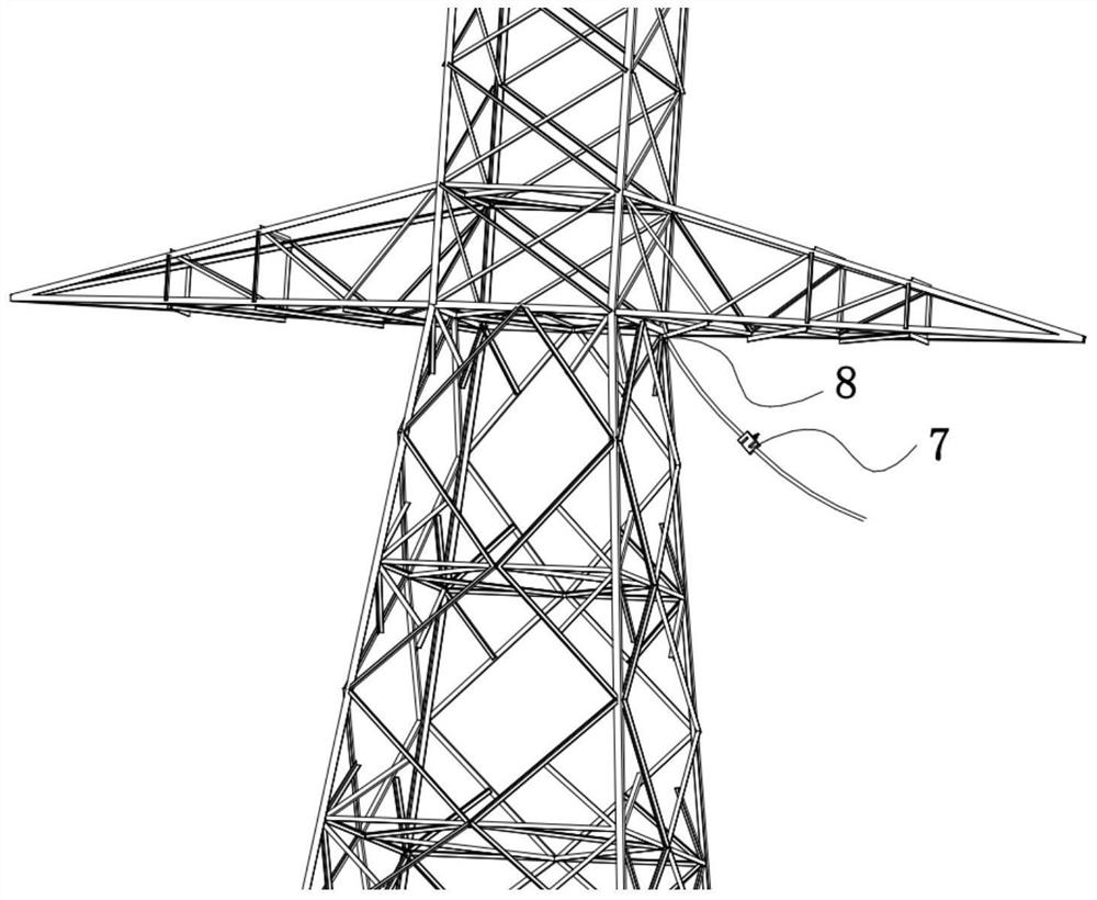 Traction system and method for lifting power transmission line tower
