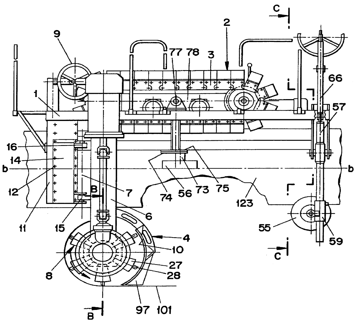 Machine for digging under pipes and caterpillar traction device