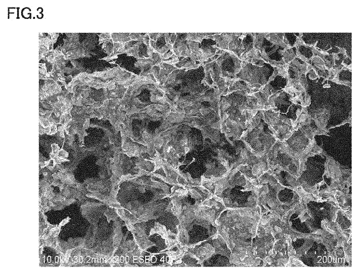 Porous composite, bone regeneration material, and method for producing porous composite