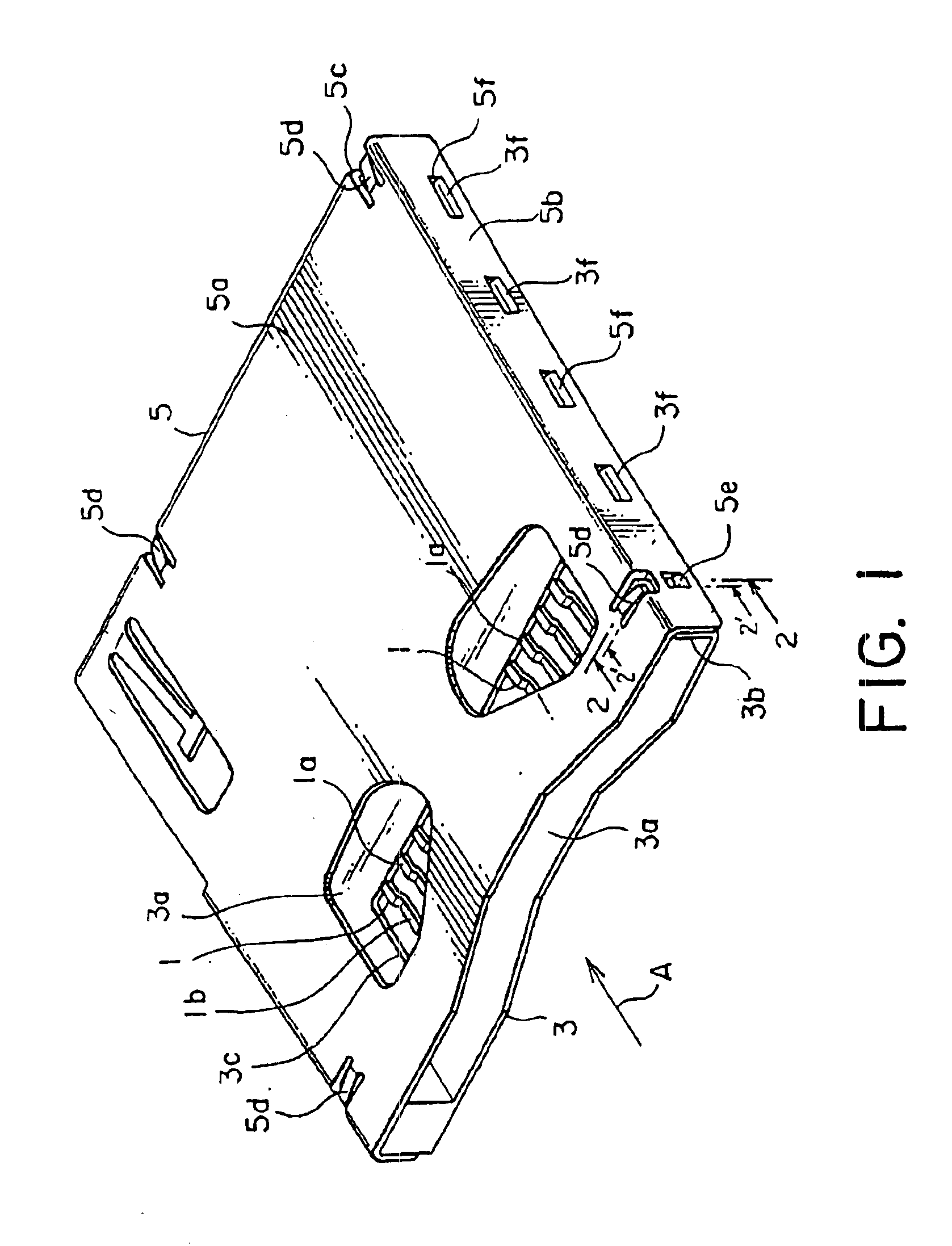 Electrical connector having a holddown for ground connection