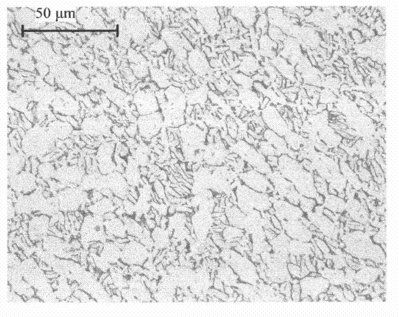 Rolling formation method of large and medium titanium alloy solid disc-shaped forge piece