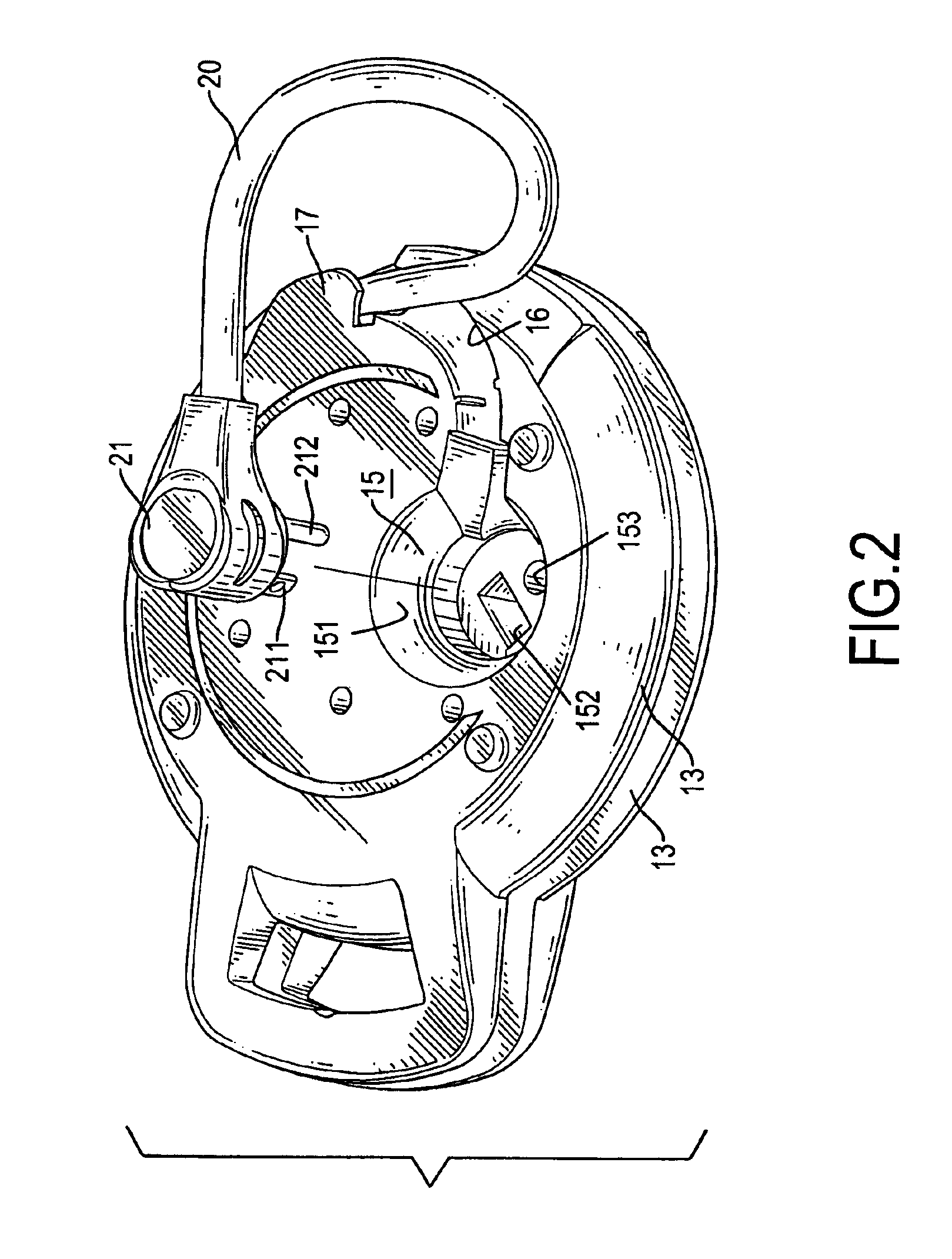 Retractable extension cord housing having a low-profile plug holder