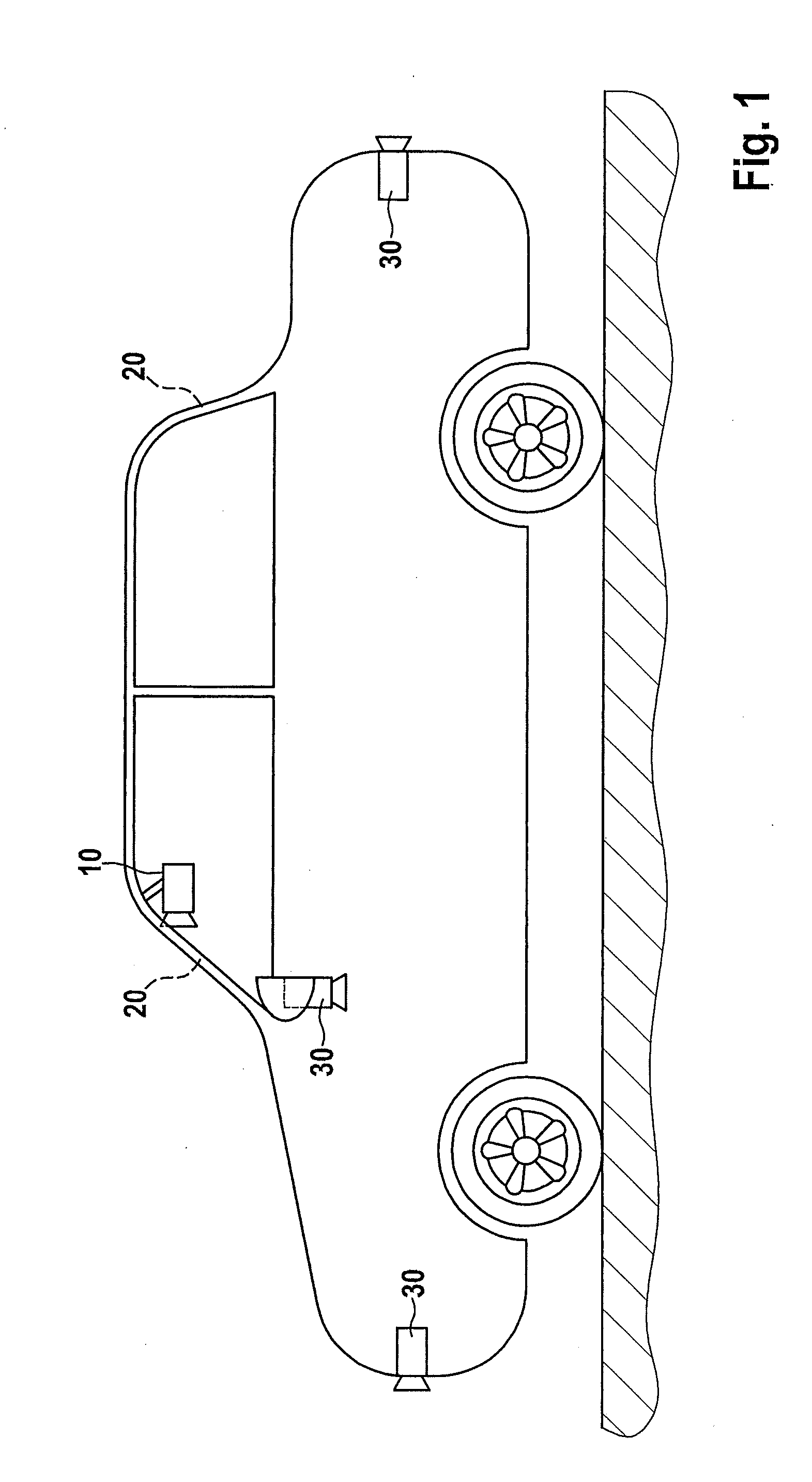 Actuating device for a device for monitoring the vehicle surroundings