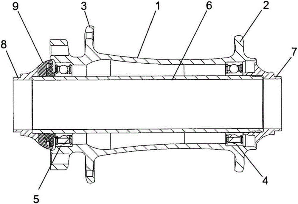 Device for adjusting the bearing play of components that are mounted such that they can rotate coaxially in relation to one another, and assembly of components that are mounted such that they can rotate coaxially in relation to one another