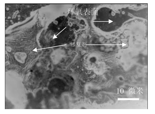 Nanometer composite epoxy resin self-repairing microcapsule and preparation method thereof
