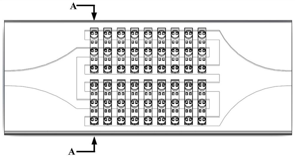 A low flow resistance chip embedded array microfluidic radiator and its manufacturing method