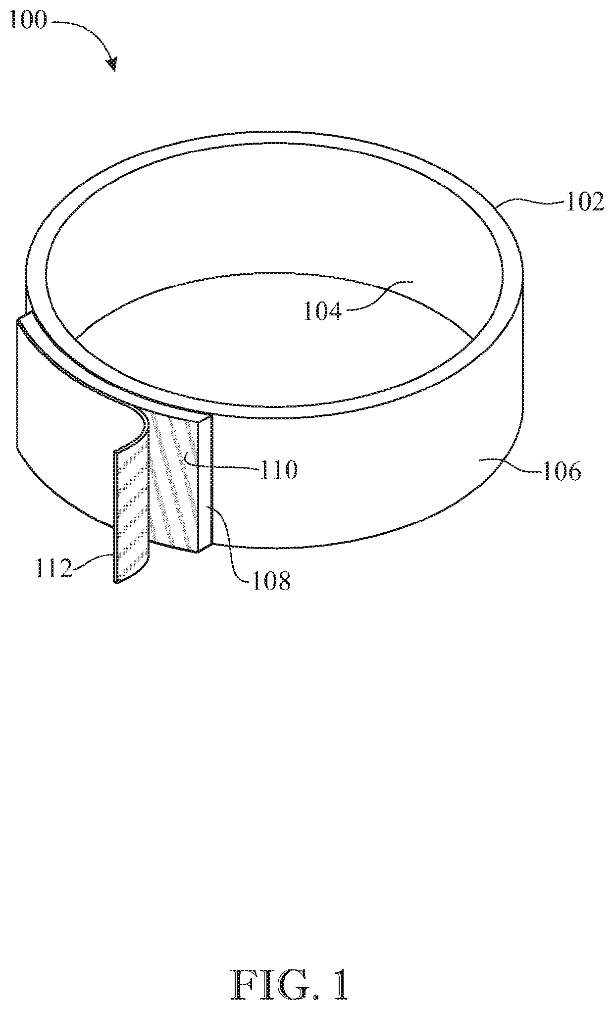 Adhesive thumb ring and syringe assembly, and an adhesive thumb ring for a syringe