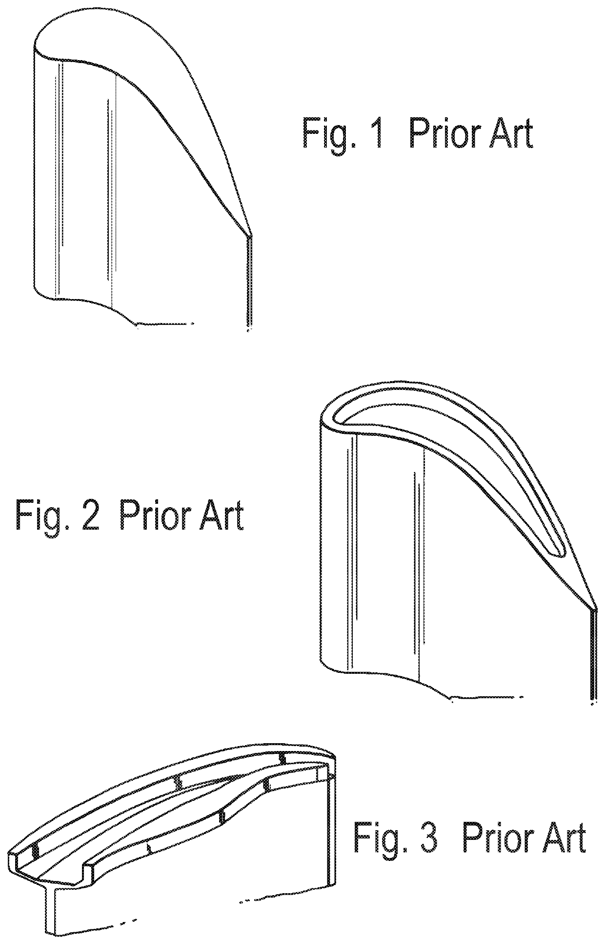 Turbine blade with tip overhang along suction side