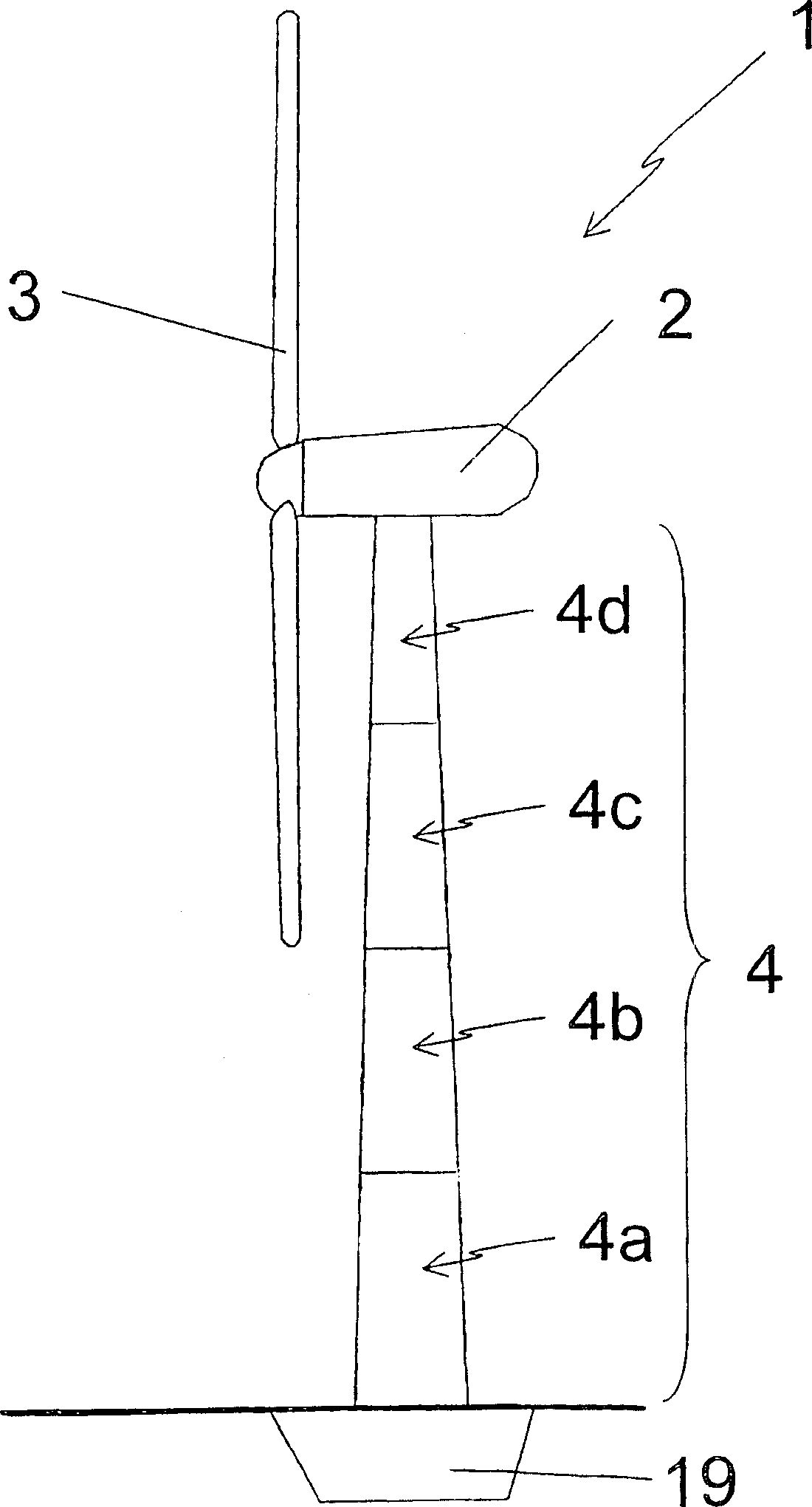 Tower for a wind turbine, prefabricated metal wall part for use in tower for a wind turbine and method for constructing a tower for a wind turbine