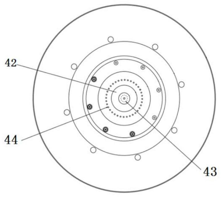 An ion lens system with reverse pressure gradient transmission