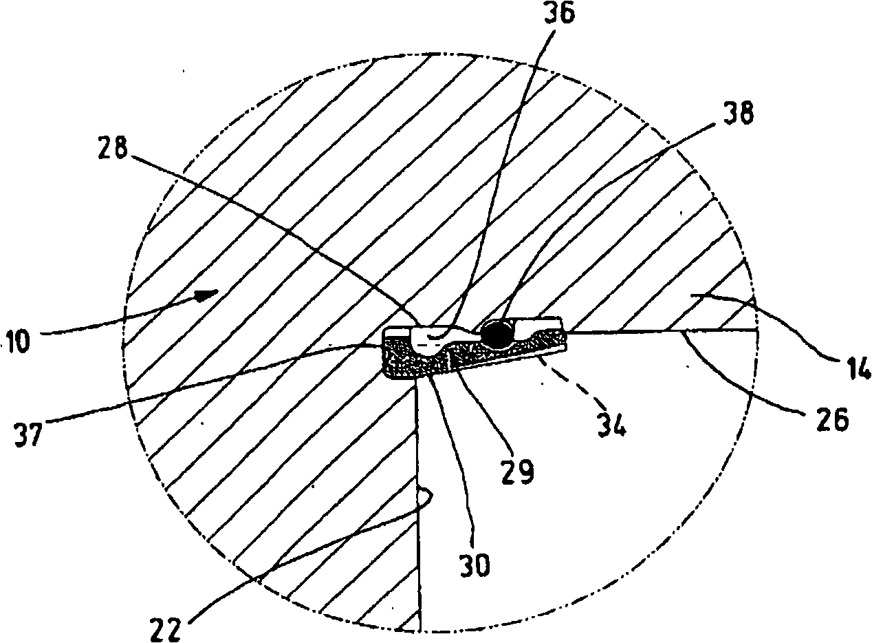 Device for detachably coupling two parts