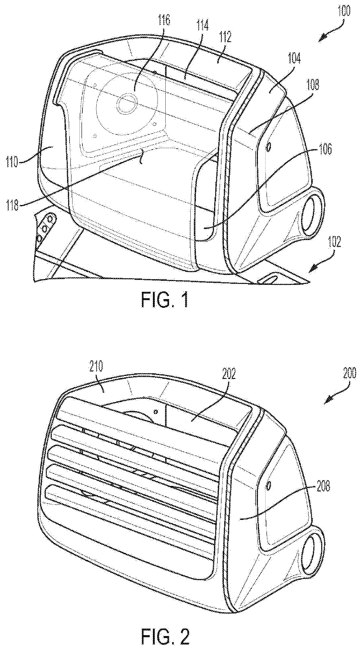 Vehicle head restraint incorporating speakers