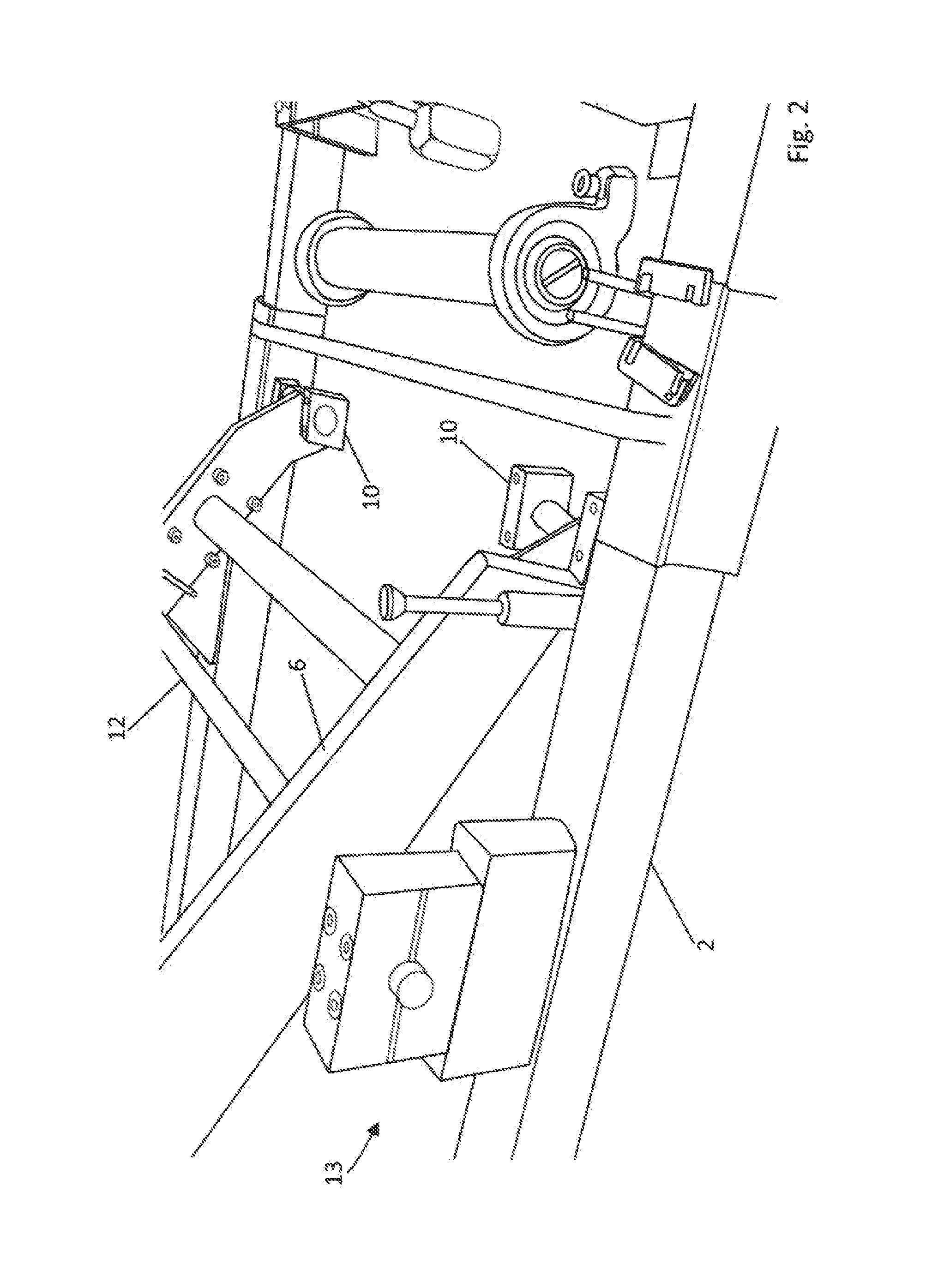 Scissor lift table and method for changing a fixed bearing of a scissor lift table
