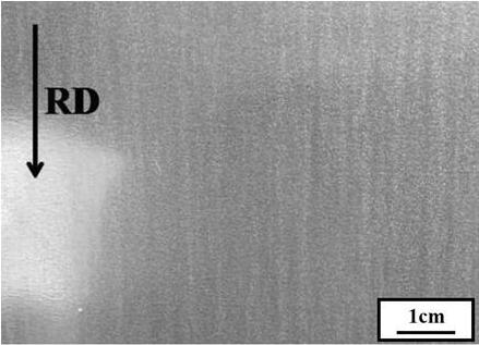 A method for producing ultra-pure ferritic stainless steel for decoration by adopting a steel coil mill