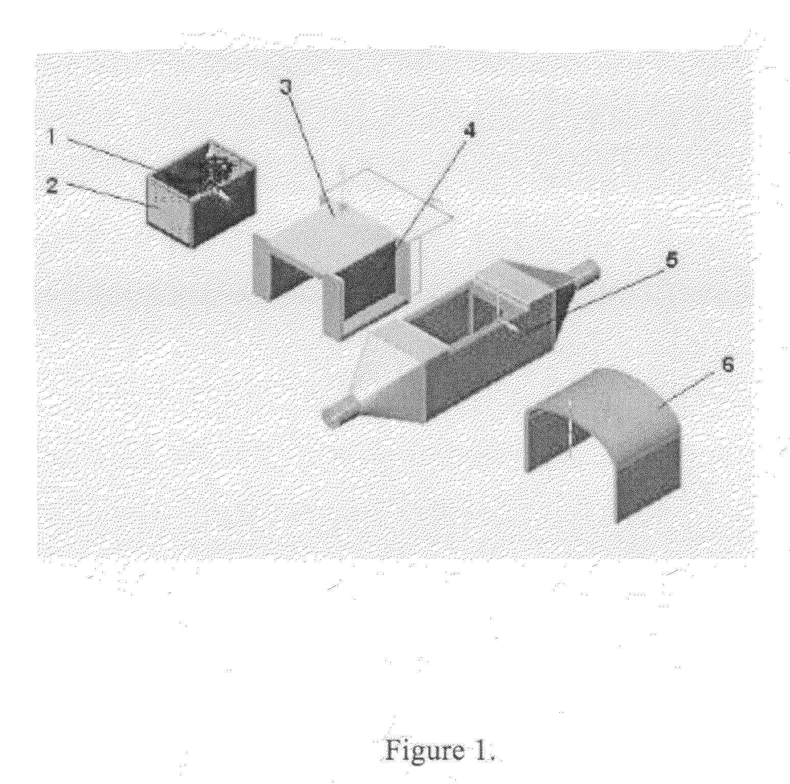 Device for the immobilization of nano- and micro-sized particles in a solid-fluid contact vessel facilitating mass-momentum, and heat-transport at the solid-fluid interfaces
