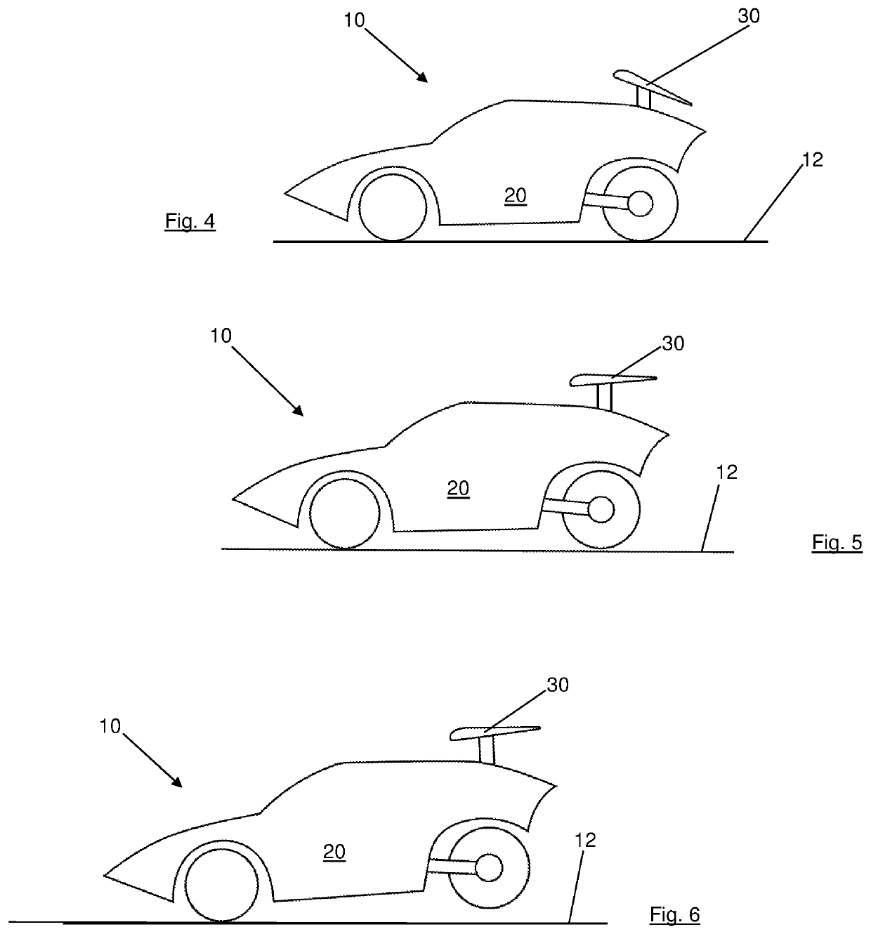 Enhanced vehicle efficiency using airfoil to raise rear wheels above road surface