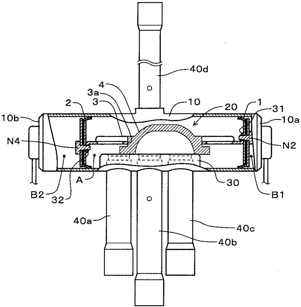 Four-way switching valve and method for welding fixing screws of four-way switching valve