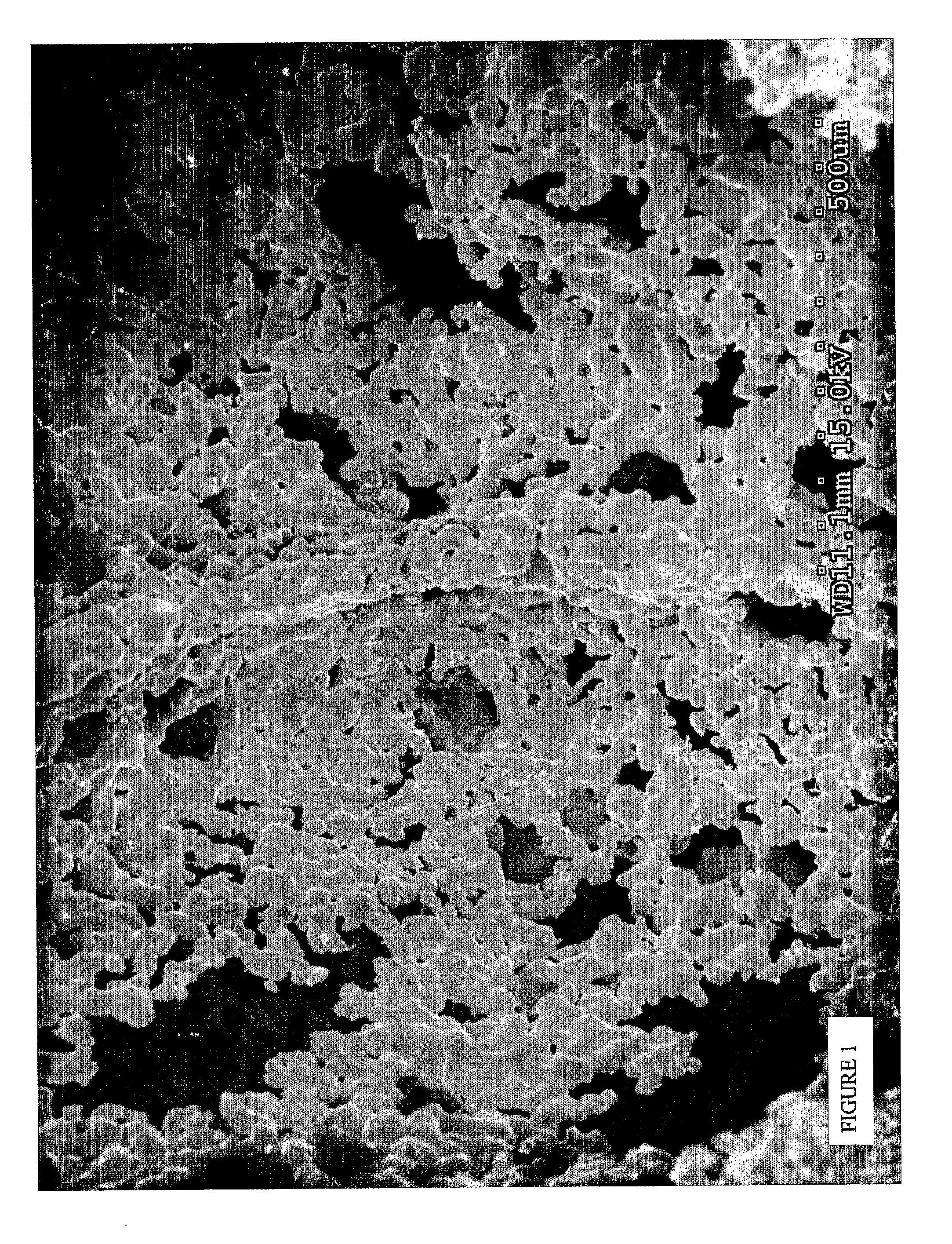Open cell porous material and method for producing same