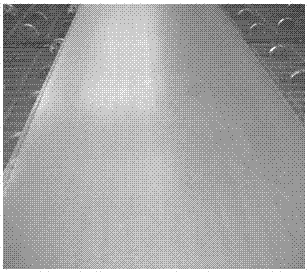 A method for eliminating mottled defects on the surface of hot-rolled steel plates
