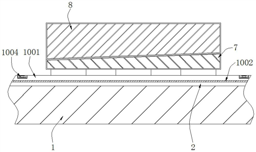 Device for reducing friction coefficient of sliding plate