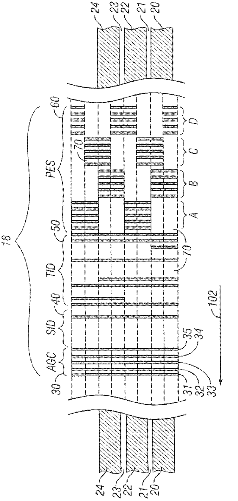 Planarized magnetic recording disk with pre-patterned surface features and secure adhesion of planarizing fill material and method for planarizing the disk