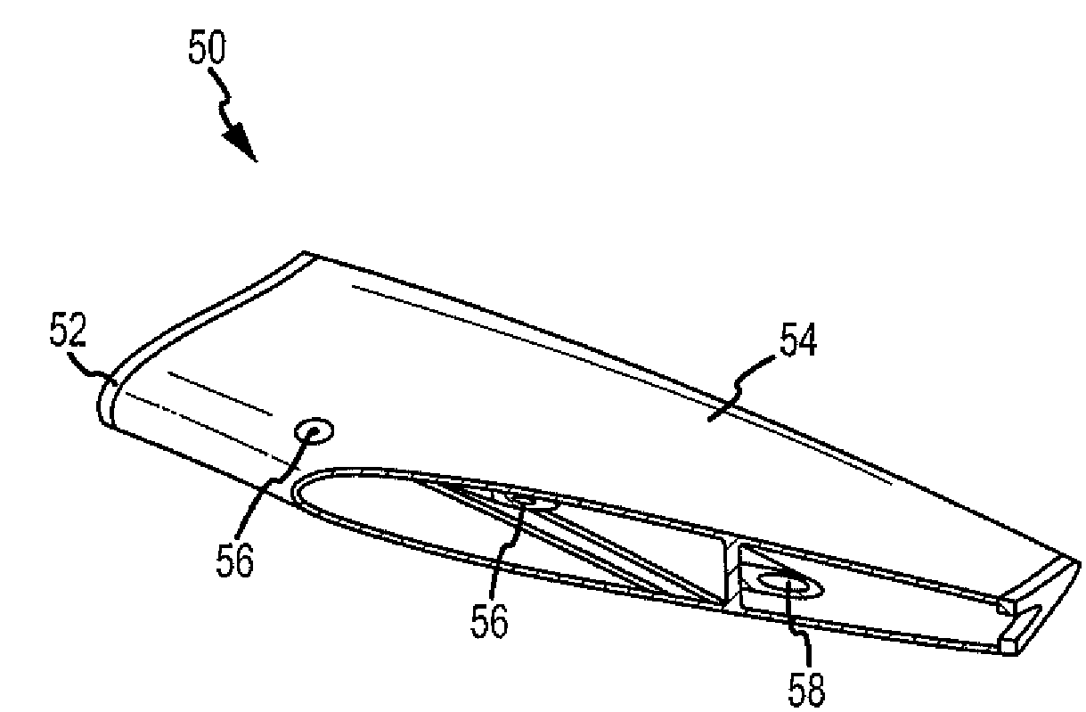 Method of manufacturing co-molded inserts