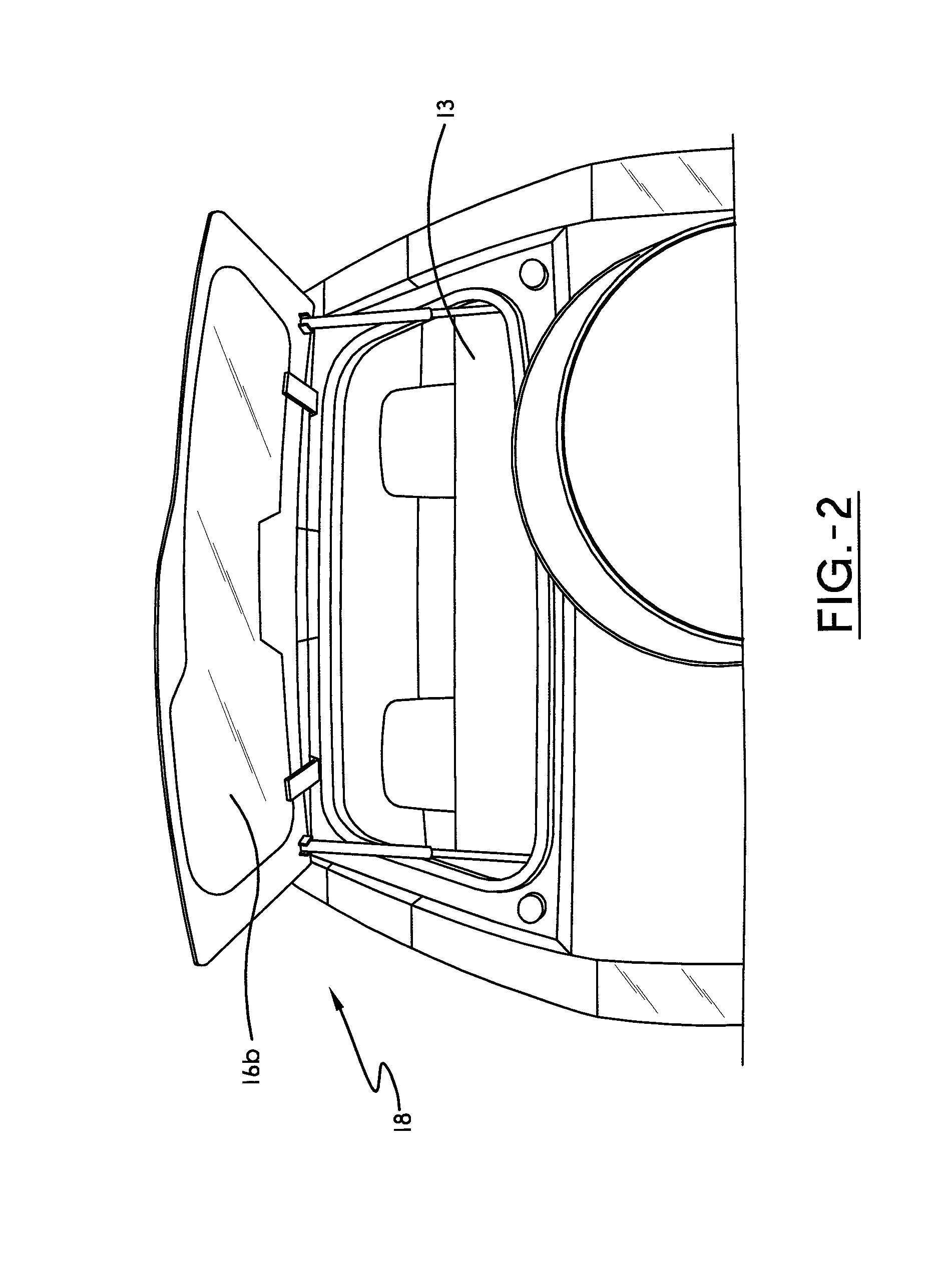 Tailgate spoiler with integrated rotating hinge cover