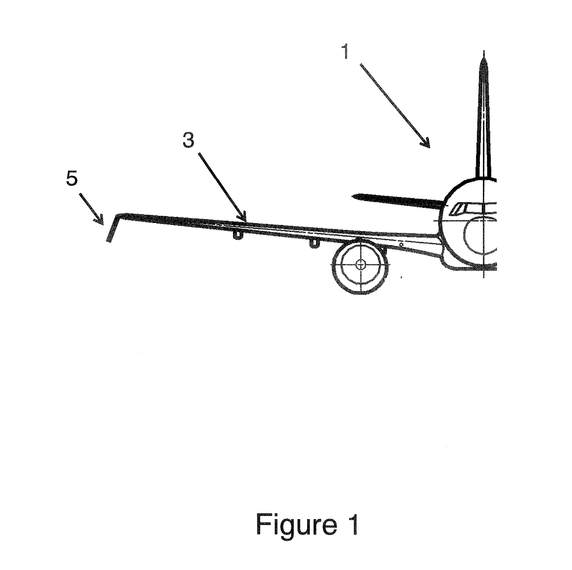 Downwardly extending wing tip device