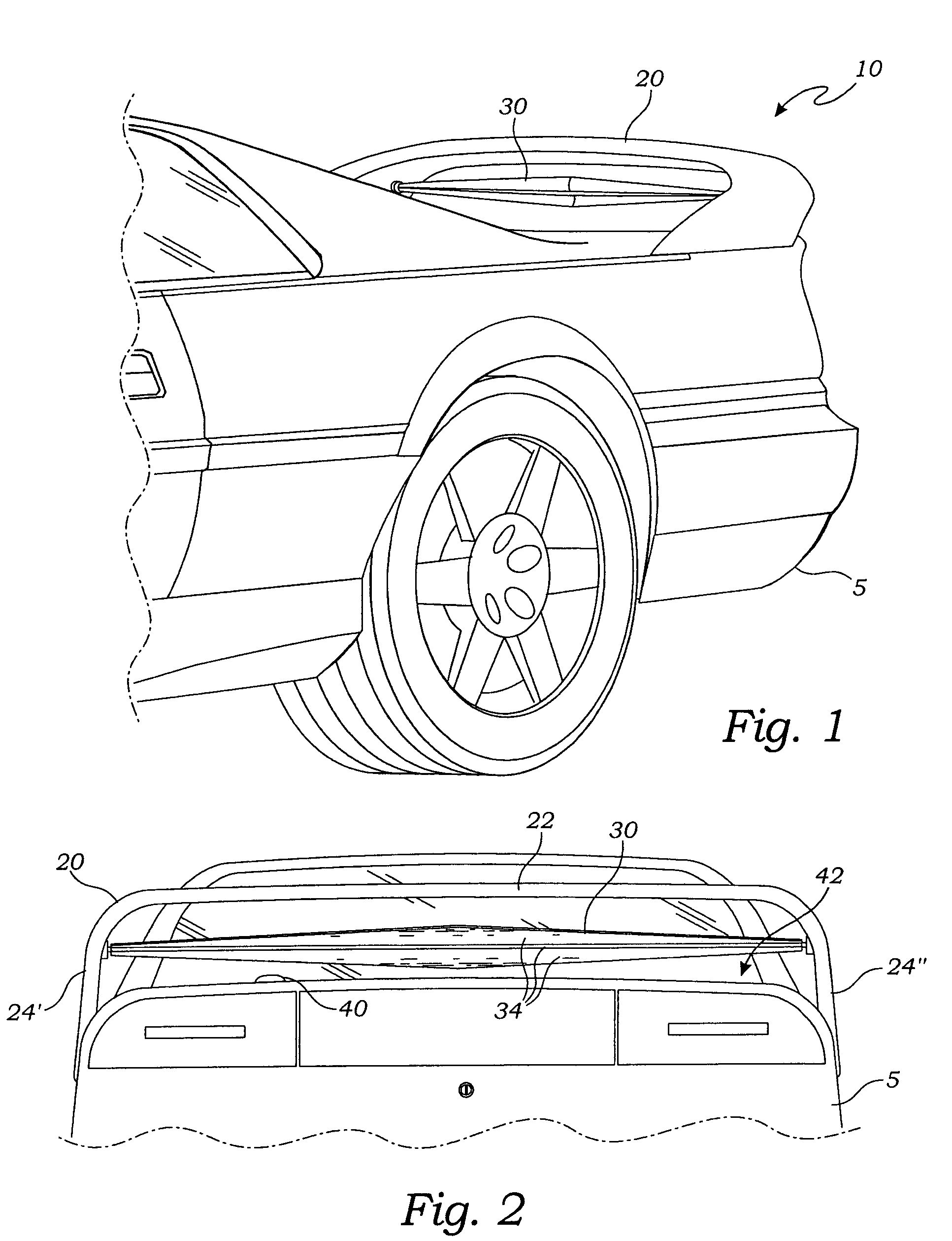 Vehicle spoiler with spinner mechanism