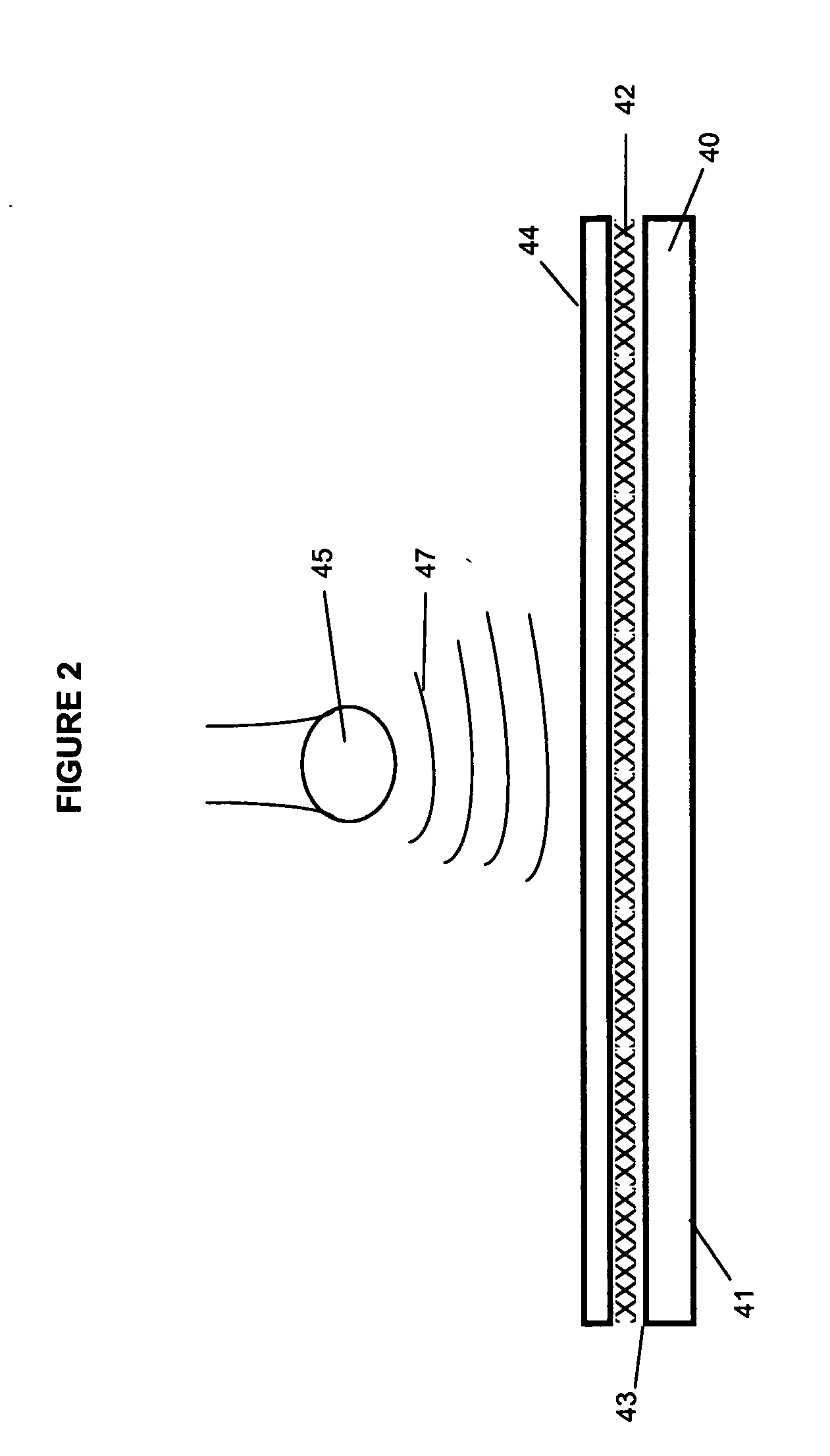 Frangible card carrier with removable layer provided in a temporary laminated assembly